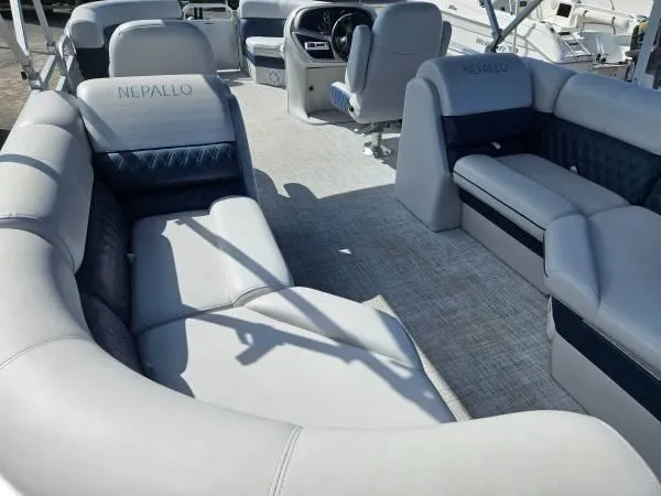 Slide: The Image of 2022 Nepallo 20QL pontoon boat interior with plush seating and modern design. - 3