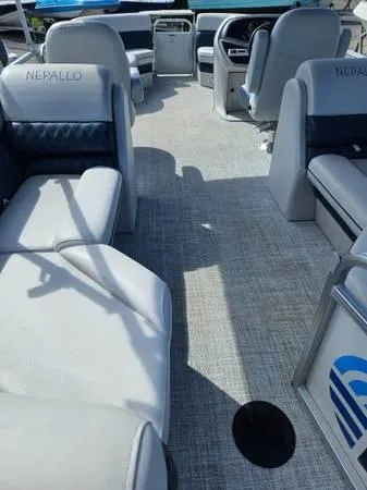 Slide: The Image of 2022 Nepallo 20QL boat interior with spacious seating and modern design. - 5