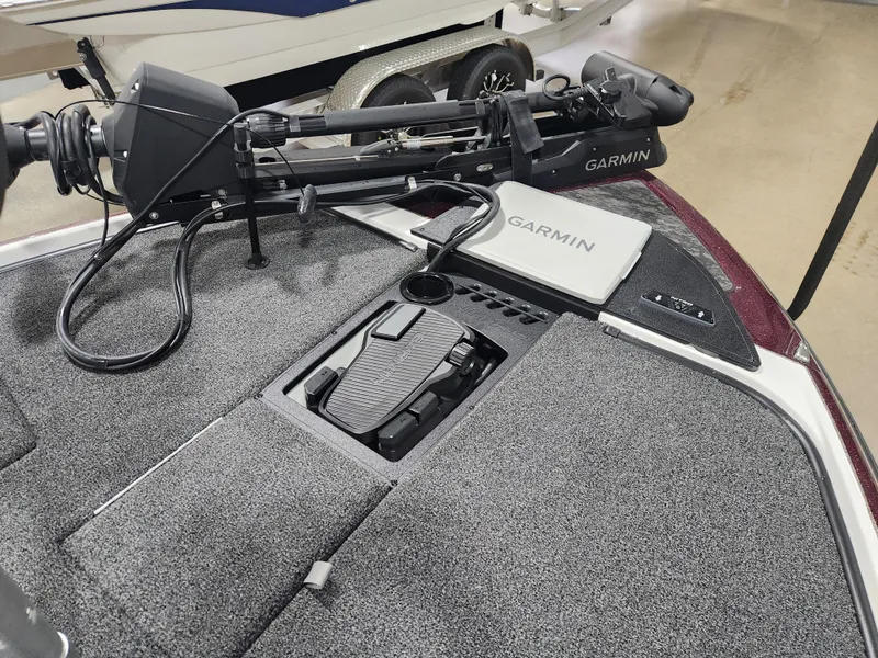 Slide: The Image of 2025 Nitro Z20 XL Pro boat deck with Garmin equipment and trolling motor. - 18