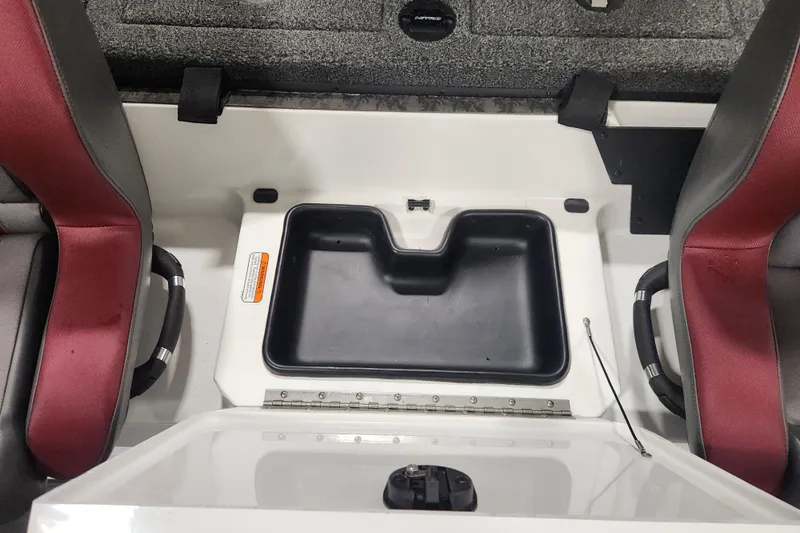Slide: The Image of 2025 Nitro Z20 XL Pro boat interior with storage compartment and seating. - 22