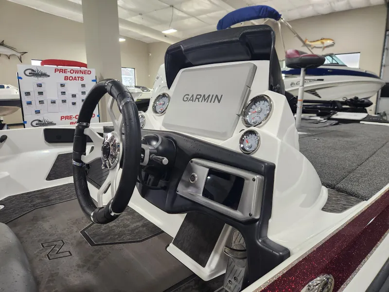 Slide: The Image of 2025 Nitro Z20 XL Pro boat dashboard with Garmin navigation system. - 24