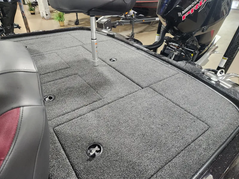 Slide: The Image of 2025 Nitro Z20 XL Pro boat deck with seating and storage compartments. - 31