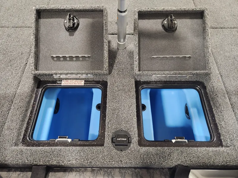 Slide: The Image of 2025 Nitro Z20 XL Pro boat storage compartments with open lids. - 34