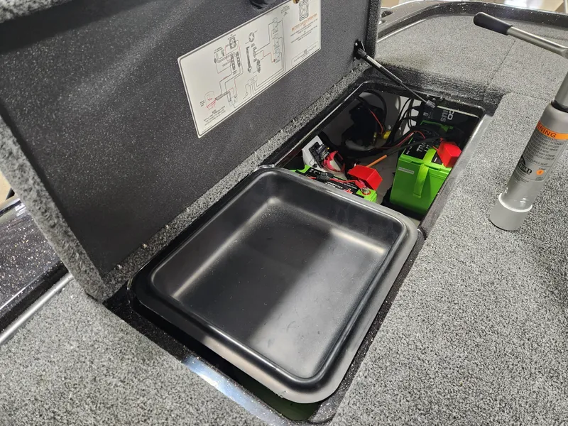 Slide: The Image of Open storage compartment in 2025 Nitro Z20 XL Pro boat. - 35