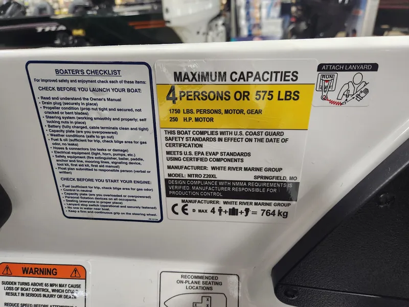 Slide: The Image of Boat capacity label for Nitro Z20 XL Pro 2025, maximum 4 persons or 575 lbs. - 39