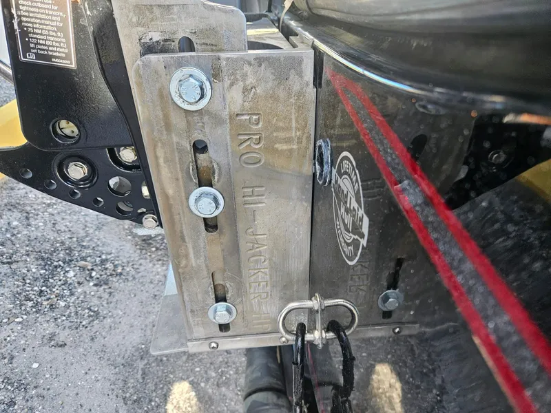 Slide: The Image of Close-up of a MotorGuide Digital Tour trolling motor on a 2006 Triton Tr-21X HP boat. - 11