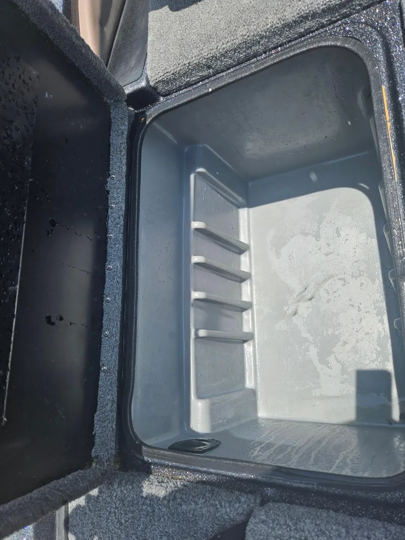 Slide: The Image of Close-up of a 2006 Triton Tr-21X HP boat jack plate with "Pro Hi-Jacker" text. - 34