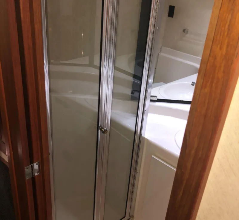 Slide: The Image of Bathroom interior of 1996 Bayliner 4788 Pilot House Motoryacht with shower and sink. - 39