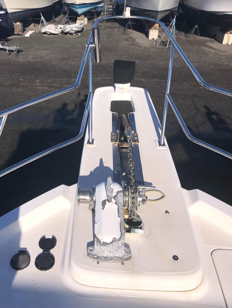 Slide: The Image of Bow of 1996 Bayliner 4788 Pilot House Motoryacht with anchor and railing. - 47