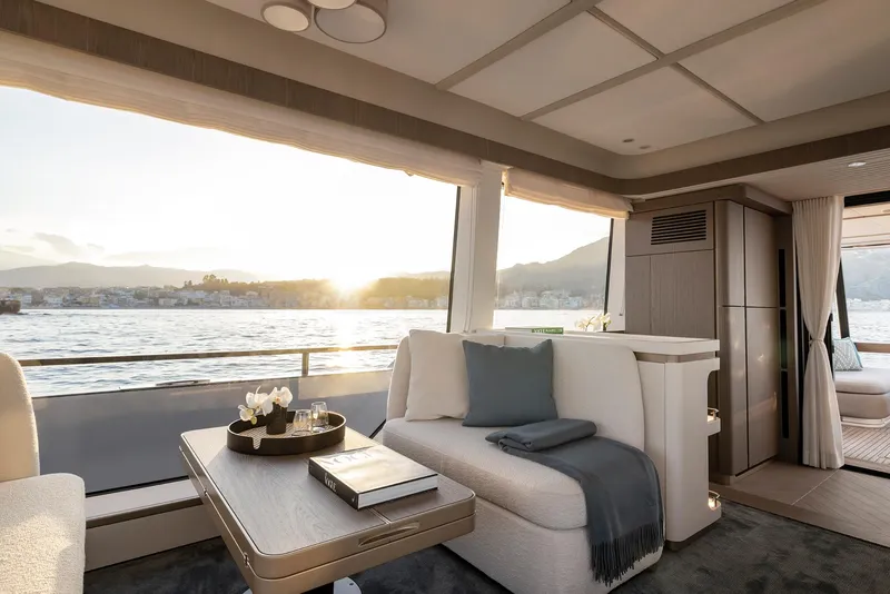 Slide: The Image of Luxurious interior of 2025 Azimut Magellano 60 yacht with scenic ocean view. - 15
