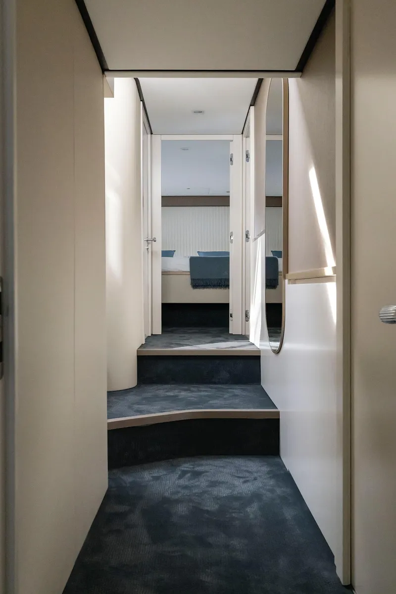 Slide: The Image of Interior hallway of 2025 Azimut Magellano 60 yacht with modern design. - 18