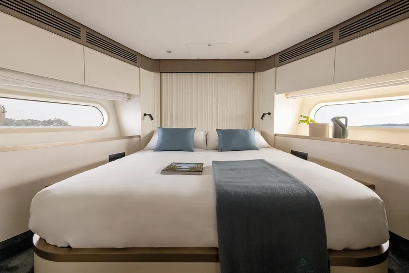Slide: The Image of Luxurious bedroom interior of 2025 Azimut Magellano 60 yacht with elegant decor. - 20