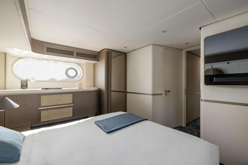 Slide: The Image of Luxurious bedroom interior of 2025 Azimut Magellano 60 yacht with modern design. - 28