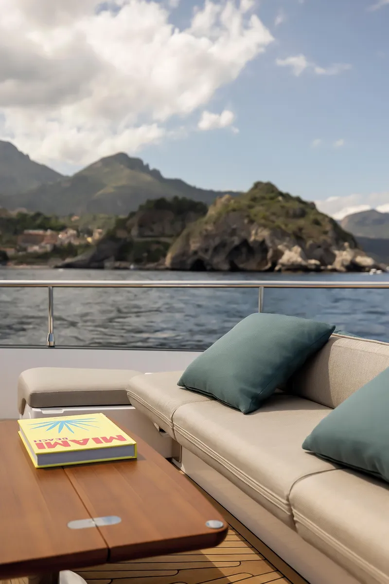 Slide: The Image of Luxury Azimut Magellano 60 yacht deck with scenic ocean view, 2025 model. - 47