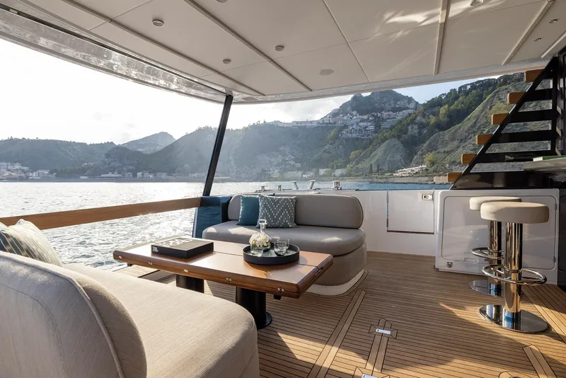 Slide: The Image of Luxurious 2025 Azimut Magellano 60 yacht interior with scenic ocean view. - 7