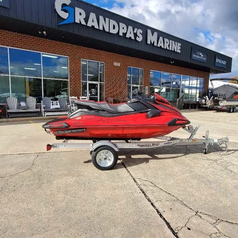 The Image of 2025 Yamaha WaveRunner VX Deluxe in red on trailer at Grandpa's Marine dealership. - 0