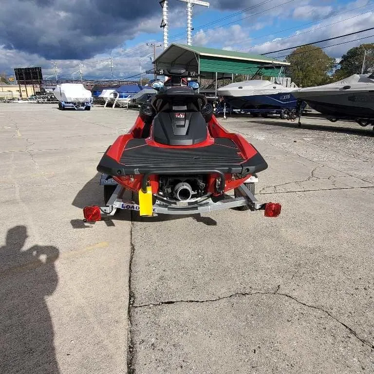 Slide: The Image of 2025 Yamaha WaveRunner VX Deluxe on trailer, parked outdoors under cloudy sky. - 3