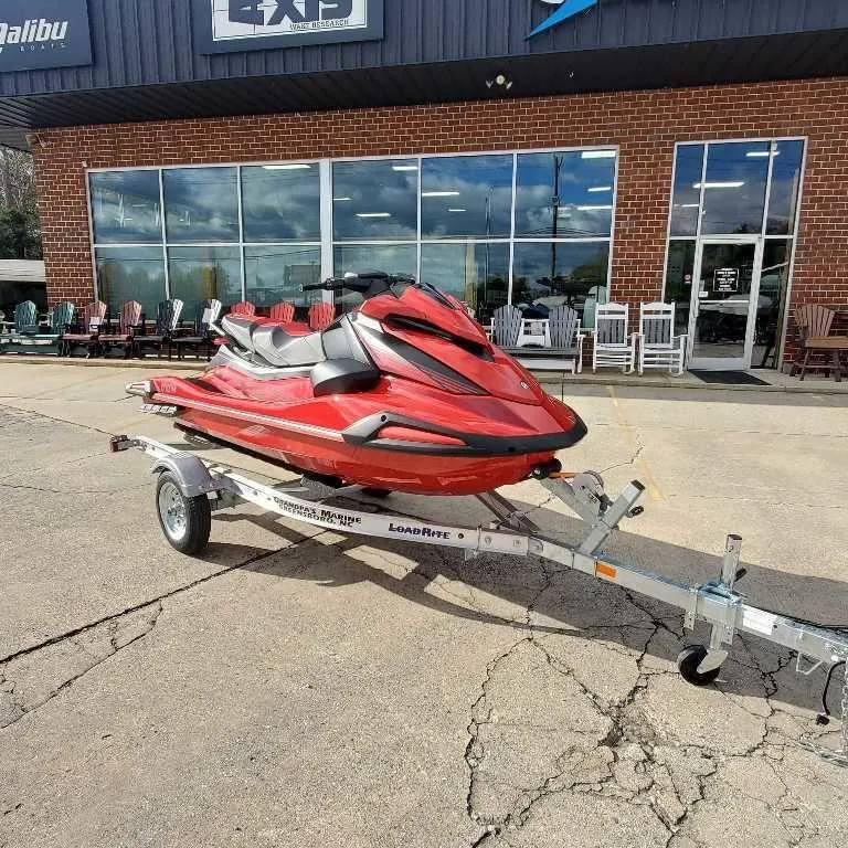 Slide: The Image of 2025 Yamaha WaveRunner VX Deluxe on trailer outside a store. - 5