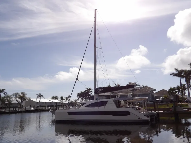 Slide: The Image of Leopard 48 catamaran docked in sunny marina, 2014 model. - 0