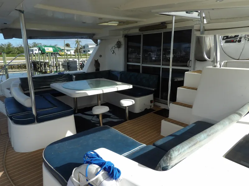 Slide: The Image of Spacious deck of 2014 Leopard 48 yacht with seating and table. - 14