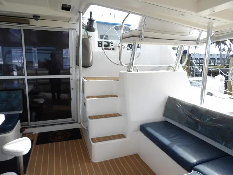 Slide: The Image of Leopard 48 yacht interior, featuring helm station, seating, and steps, 2014 model. - 24