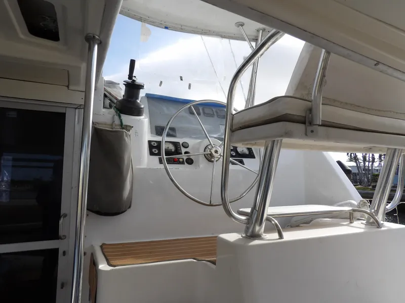 Slide: The Image of Interior view of 2014 Leopard 48 yacht helm with steering wheel and controls. - 26