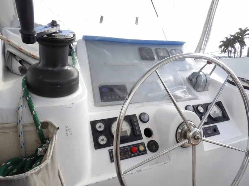 Slide: The Image of Leopard 48 yacht helm with steering wheel and control panel, 2014 model. - 27