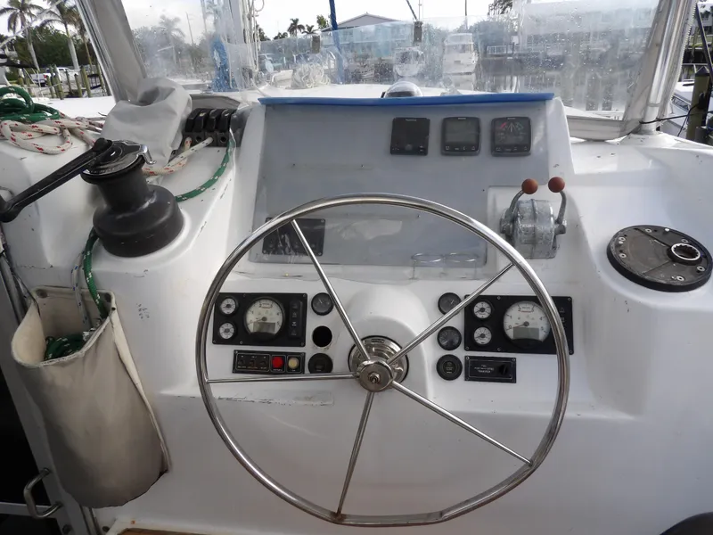 Slide: The Image of Steering wheel and control panel of a 2014 Leopard 48 yacht. - 28