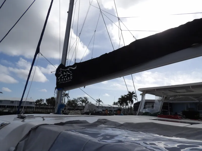 Slide: The Image of Leopard 48 sailboat from 2014 docked under a partly cloudy sky. - 40