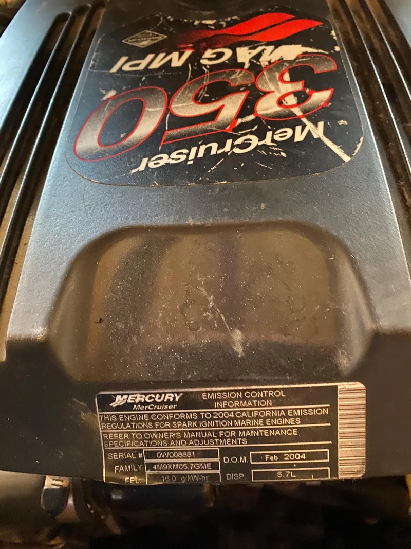 Slide: The Image of Mercury MerCruiser 350 engine in a 1962 Lyman 24 Sleeper Hardtop boat. - 39