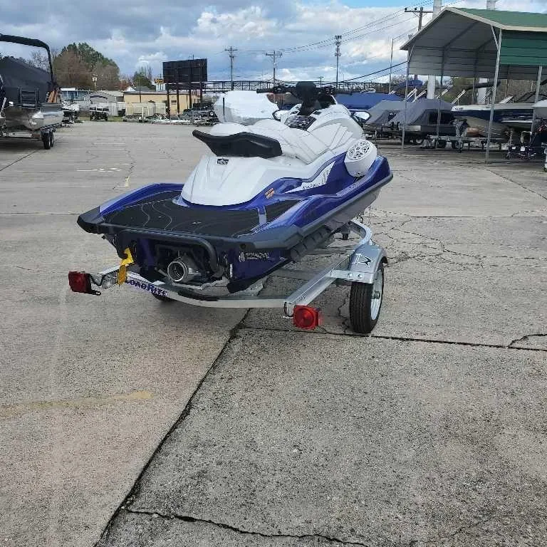 Slide: The Image of 2025 Yamaha WaveRunner GP SVHO with Audio on trailer in parking lot. - 5