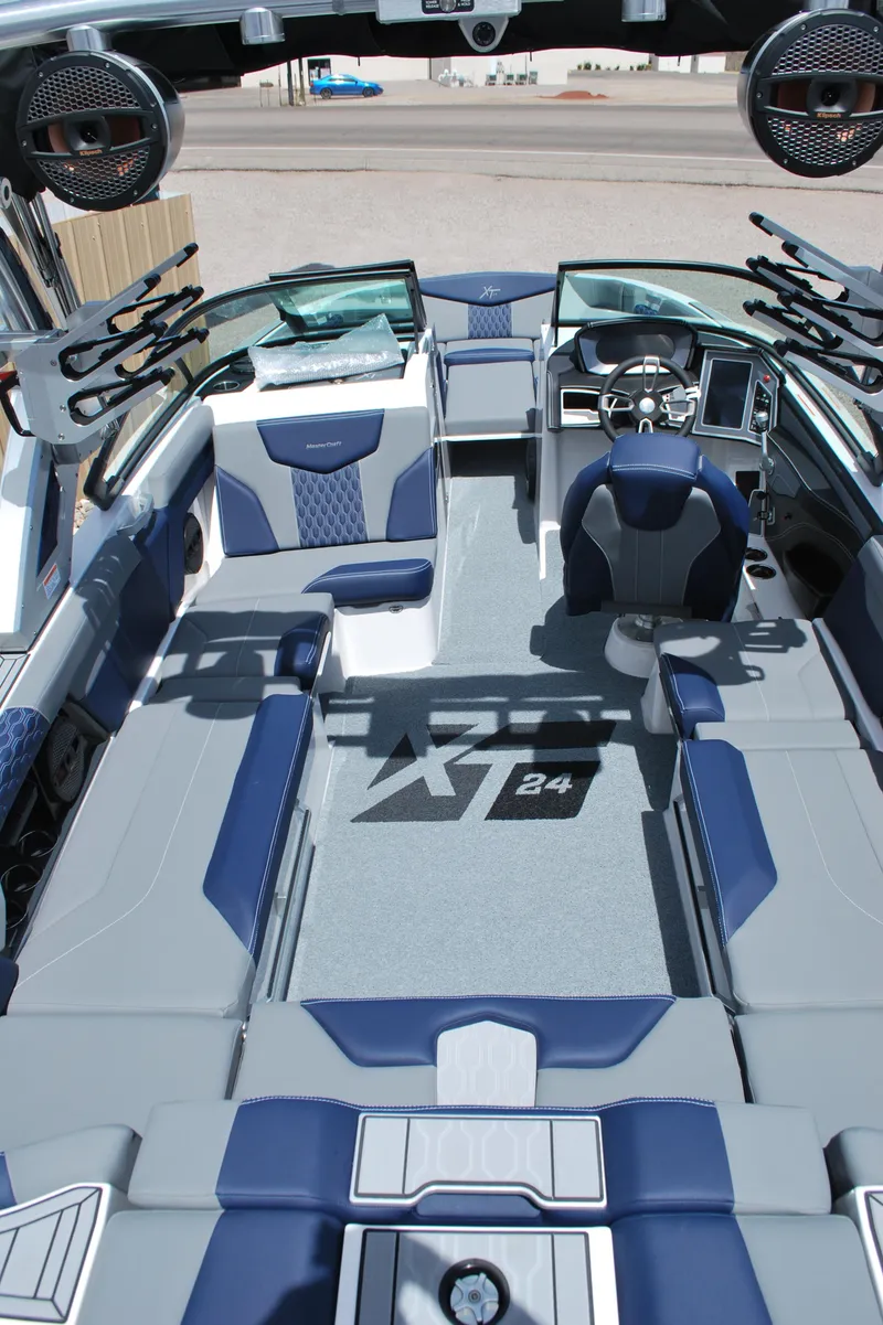 Slide: The Image of 2024 MasterCraft XT24 boat interior with modern design and advanced features. - 10