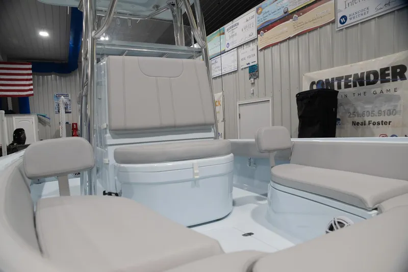 Slide: The Image of 2024 Contender 26 Bay boat interior with seating and helm station. - 11