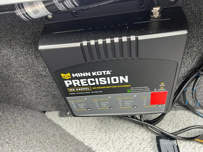 Slide: The Image of Minn Kota Precision MK 440PC onboard battery charger in 2025 Lund 1975 Tyee boat. - 15