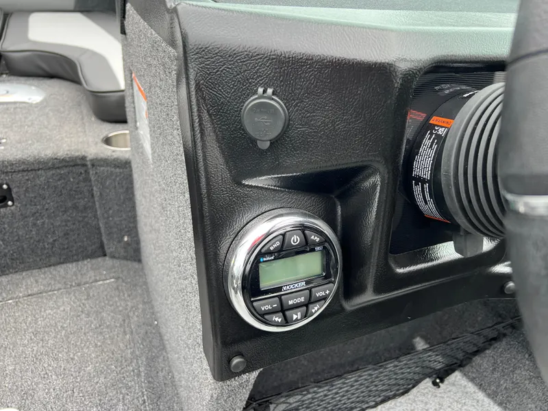 Slide: The Image of Dashboard of 2025 Lund 1975 Tyee boat with control panel and audio system. - 21