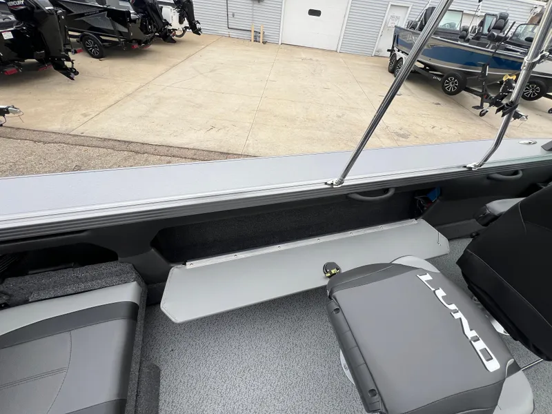 Slide: The Image of Interior of 2025 Lund 1975 Tyee boat with seating and storage. - 33