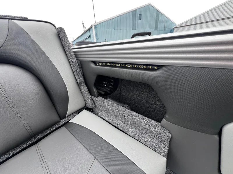 Slide: The Image of Interior of 2025 Lund 1975 Tyee boat with gray seating and modern design. - 35