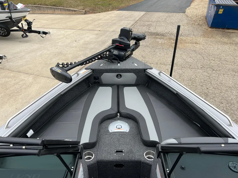 Slide: The Image of Lund 1975 Tyee 2025 boat interior with modern navigation equipment. - 7