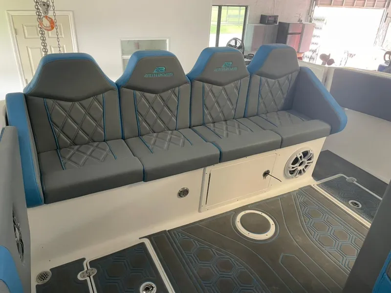 Slide: The Image of Luxurious AMP 333 boat seating, 2021 model, with diamond-stitched upholstery and integrated speaker. - 22