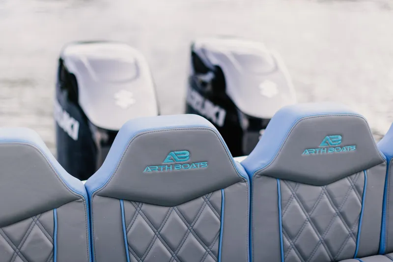 Slide: The Image of Luxury boat seats with diamond stitching, AMP 333 model, 2021, featuring dual outboard motors. - 26