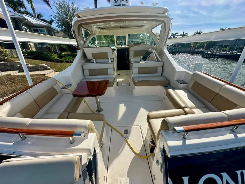 Slide: The Image of 2012 Tiara Yachts 3100 Coronet with spacious seating and elegant interior design. - 12