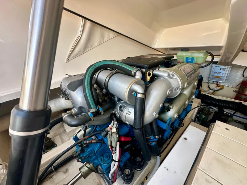 Slide: The Image of Engine compartment of 2012 Tiara Yachts 3100 Coronet, showcasing detailed mechanical components. - 32