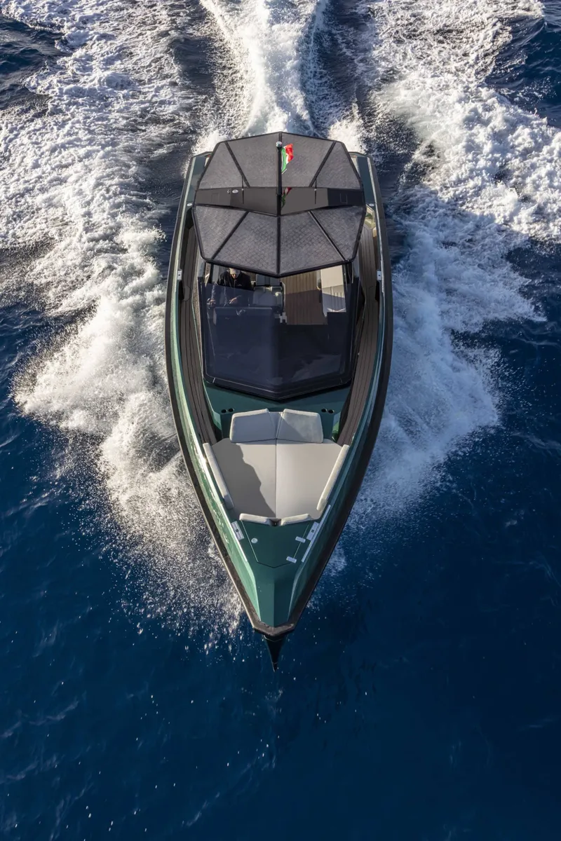 Slide: The Image of Wally wallytender43 2026 cruising on open sea, aerial view. - 34