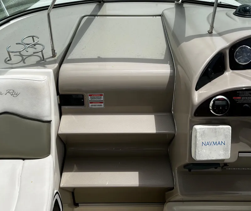 Slide: The Image of Interior view of 2006 Sea Ray 260 Sundancer boat with Navman equipment. - 4