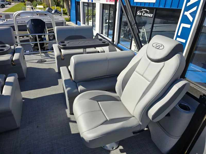 Slide: The Image of 2025 Bentley Pontoons 223 Quad Swingback Legacy Tritoon interior with luxurious seating and modern design. - 10