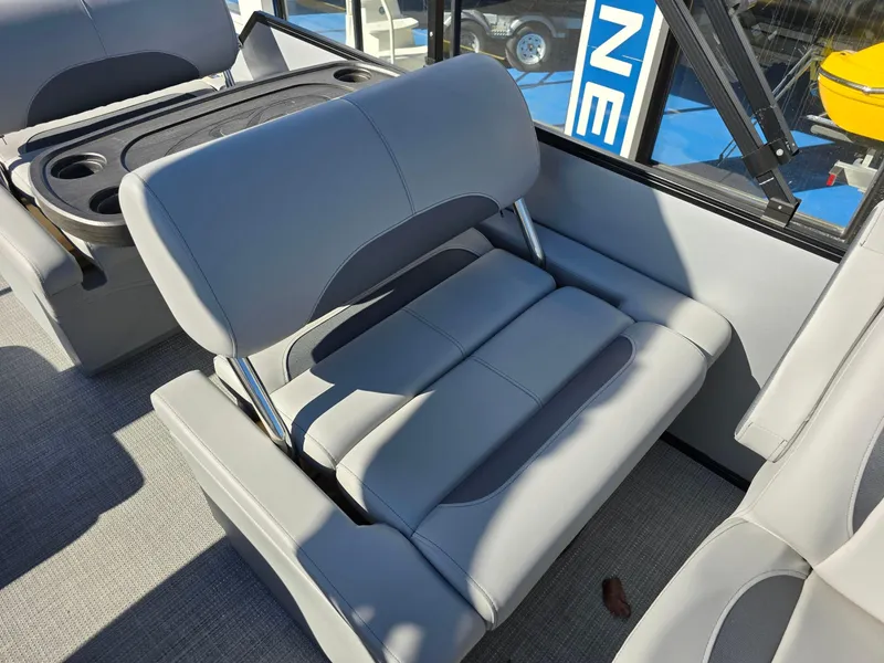 Slide: The Image of 2025 Bentley Pontoons 223 Quad Swingback Legacy Tritoon interior seating, featuring gray upholstery. - 14