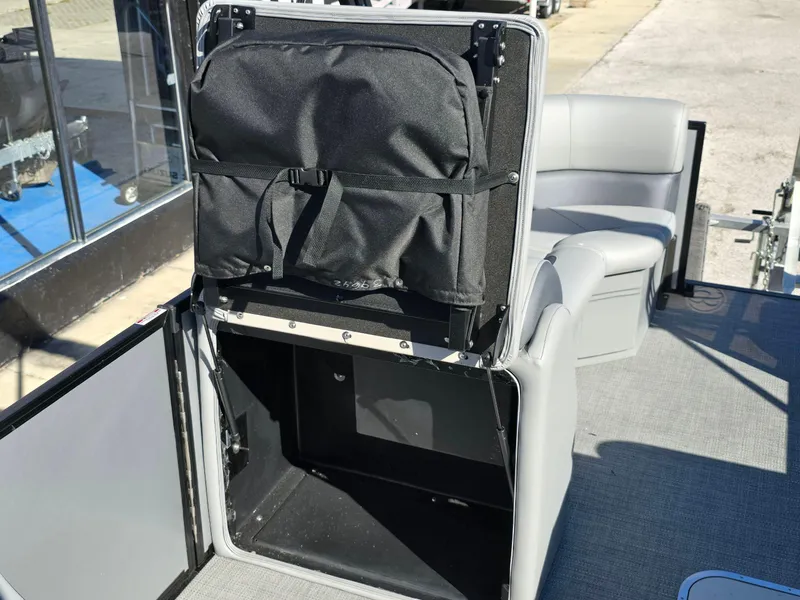 Slide: The Image of 2025 Bentley Pontoons 223 Quad Swingback Legacy Tritoon interior storage compartment. - 15