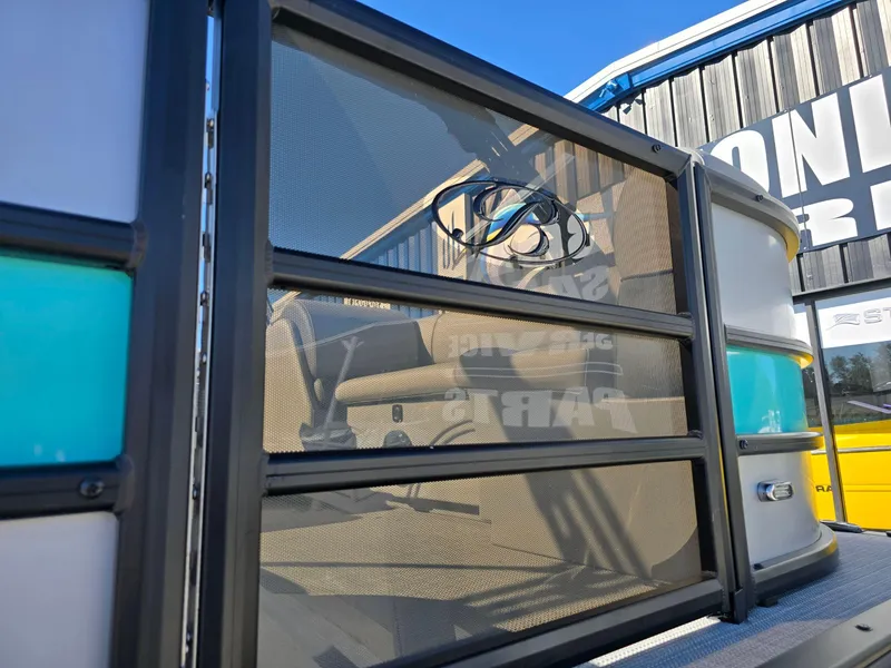 Slide: The Image of 2025 Bentley Pontoons 223 QUAD SWINGBACK LEGACY TRITOON, close-up of side panel design. - 5
