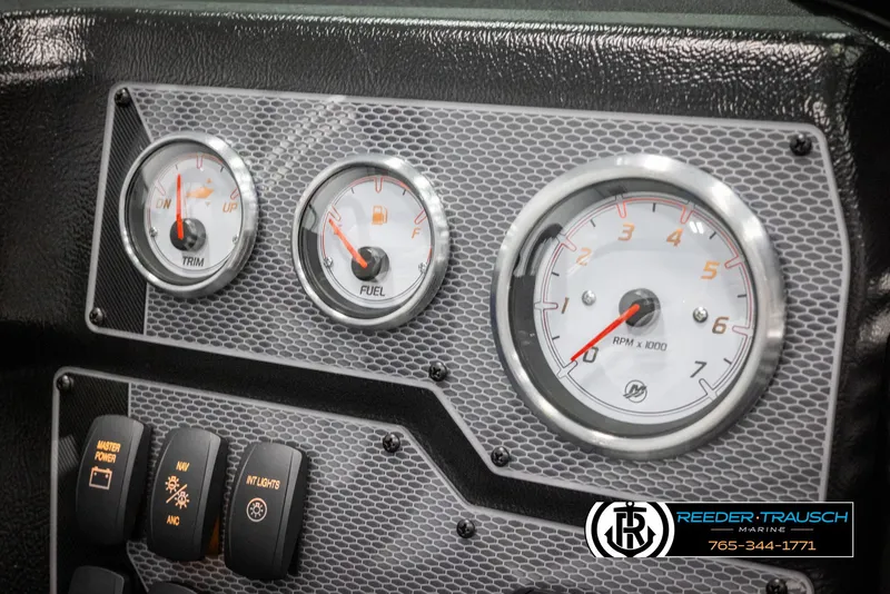 Slide: The Image of Dashboard of 2025 Lund 1975 Tyee boat with gauges and switches. - 30