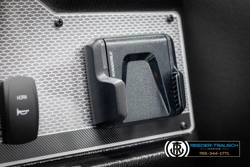 Slide: The Image of Close-up of 2025 Lund 1975 Tyee dashboard with horn button and accessory mount. - 32